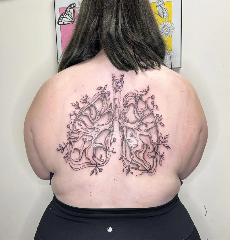 I loved doing this lung back piece last week! * * * #backtattoo #lungs #lungtattoo #leaves #vines #finelineart…