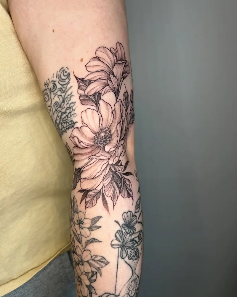 Swipe to see more angles ➡️ * * * #elbowtattoo #armtattoo #flowertattoo #fillertattoo #elbowditch #blackandgreytattoo…