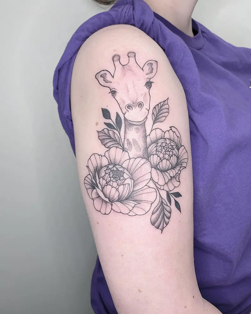 Super cute giraffe and flowers from the other day 🦒 * * * #giraffetattoo #animaltattoo #giraffe #animalportrait…