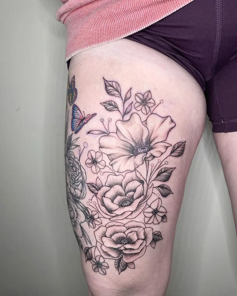 Got to add more flowers to this thigh piece! * * * #thighpiece #largetattoo #colorfulbutterfly #colortattoo…
