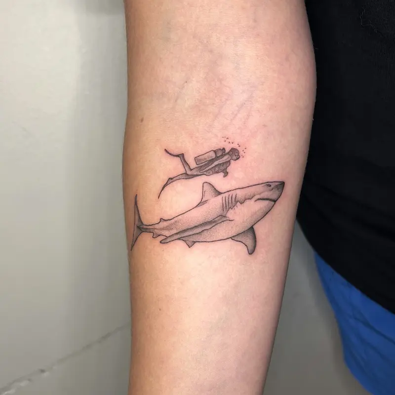 Diver and shark, which was my first tattoo after coming back from vacation. 🎉 * * * #sharktattoo #divertattoo #shark…
