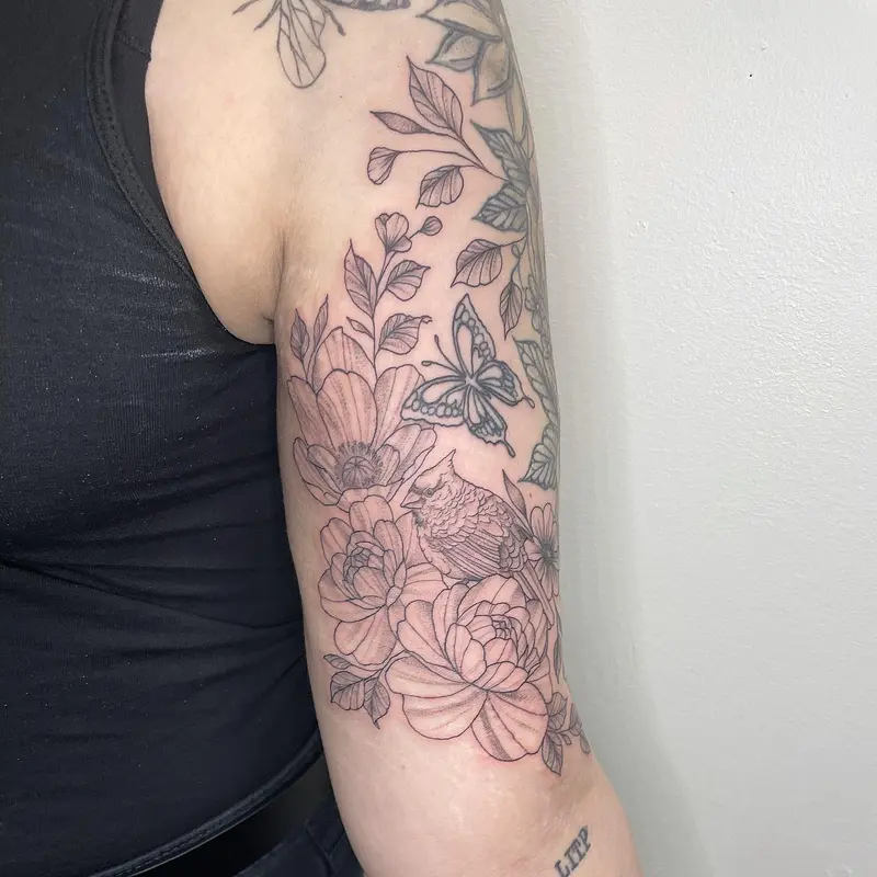 Added this cardinal and flowers to eventually make a half sleeve. (Healed work is not mine, but I did touch up the…