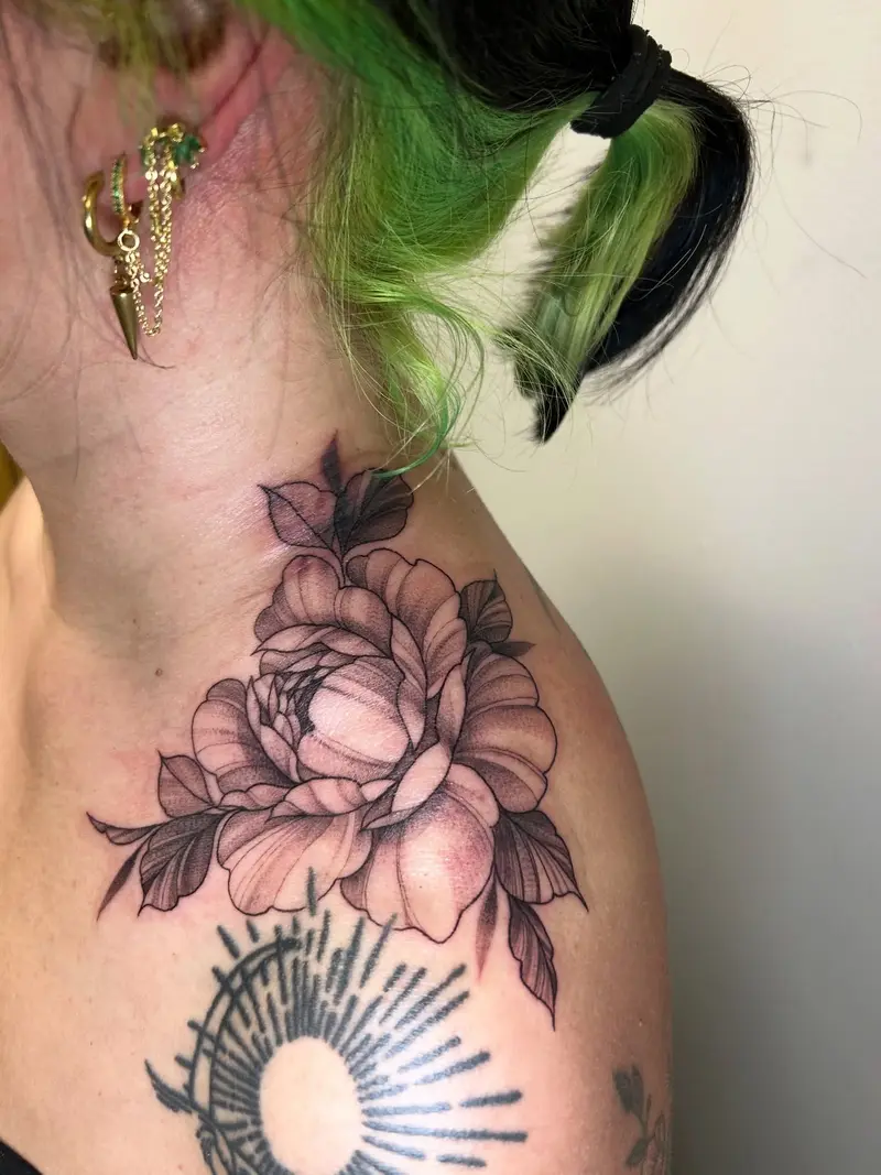 Obsessed with the placement for these flowers. Swipe to see a healed back piece from a few years ago that’s one of my…