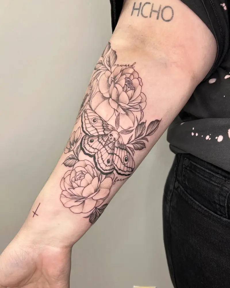 Death moth from last week. Love doing tattoos like this!! * * * #mothtattoo #armtattoo #deathmoth #skull #flowers