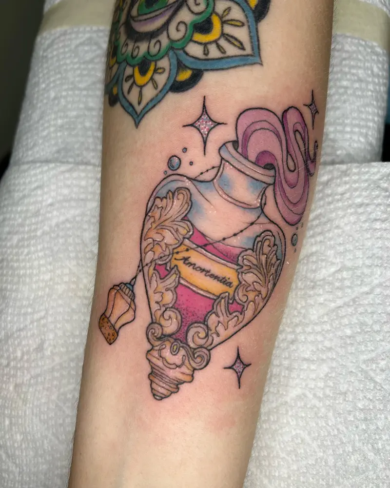 Breaking up the flora/fauna tattoos with a cute little potion bottle. I loved getting to do this piece, especially…