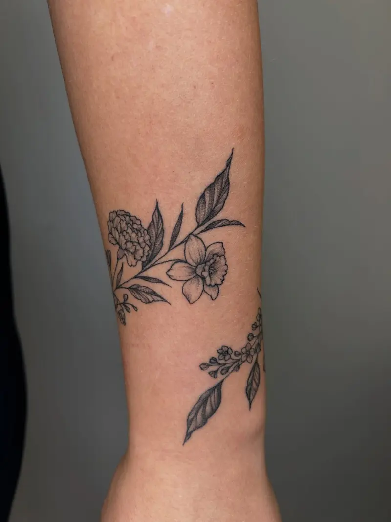Healed wrap around and Roman numerals #healedtattoo #wristtattoo #romannumerals #birthmonthflowers #wraparoundtattoo