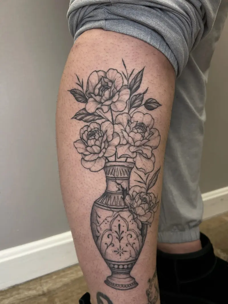 Fully healed cracked vase. #legtattoo #vasetattoo #roses #localartist #billerica