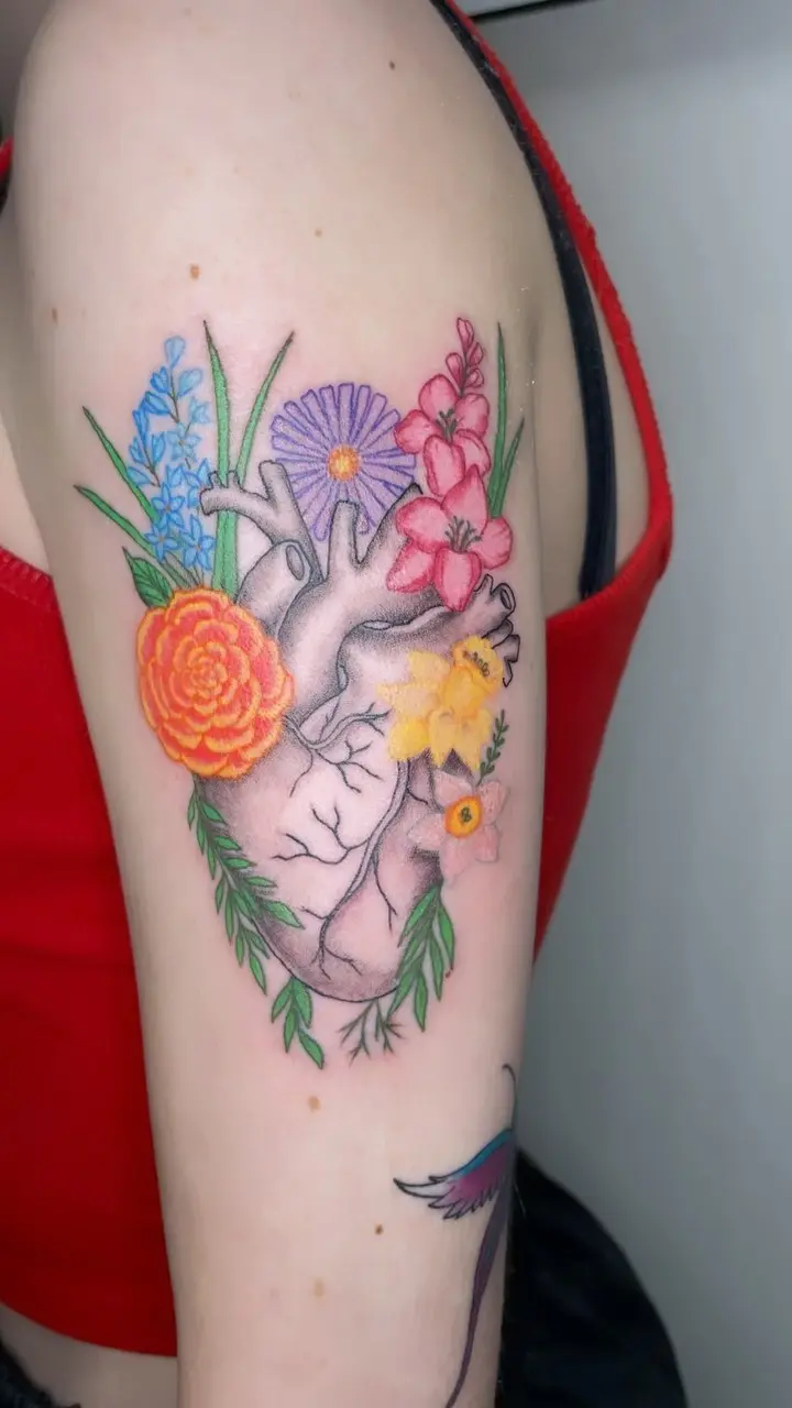 Wait 🤔 * * * #anatomydrawing #anatomicalhearttattoo #flowers #fullcolortattoo #blackandgrey #birthmonth #realism…
