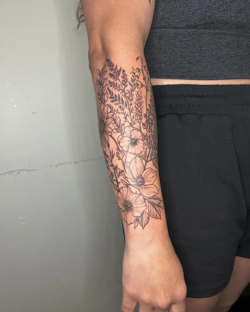 Added to a sleeve in progress last week 💐 * * * #sleeve #wildflowers #wildflowersleeve #wildflowertattoo #armtattoo…