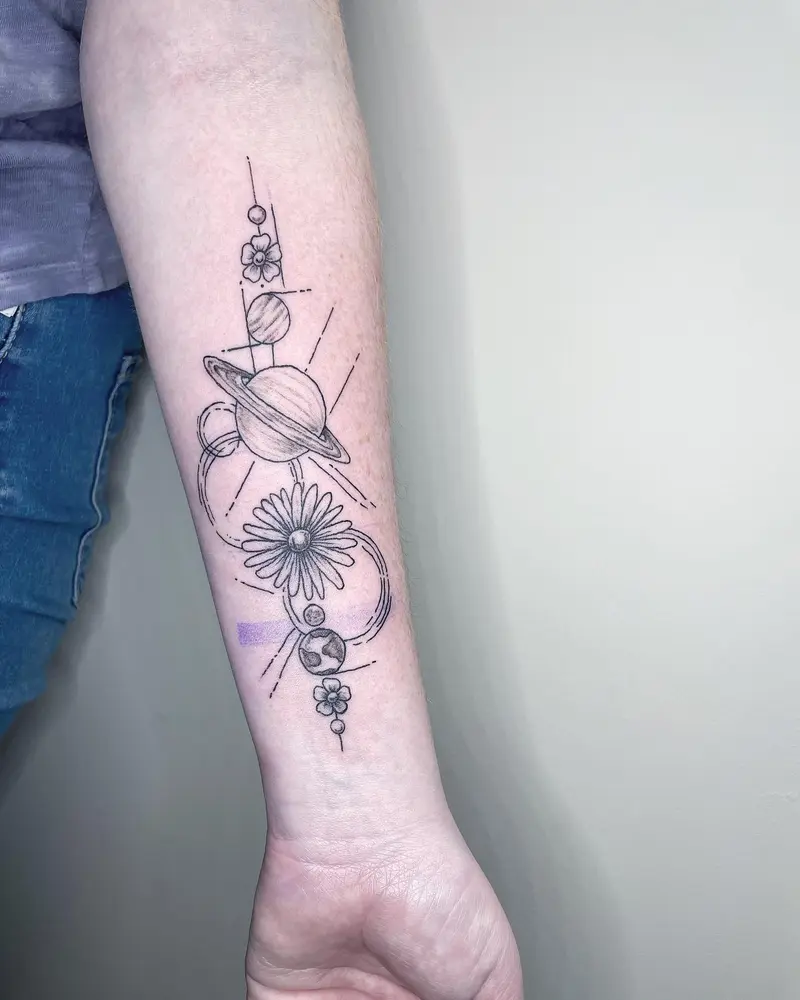 🪐 * * * * #planets #spacetattoo #planetstattoo #daintytattoo #flowertattoo #aster #asterflower #buttercup