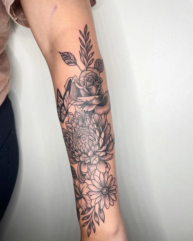 Floral arrangement I did recently * * * #birthflowers #halfsleeve #tattooideasforgirls #butterfly #meaningfultattoo