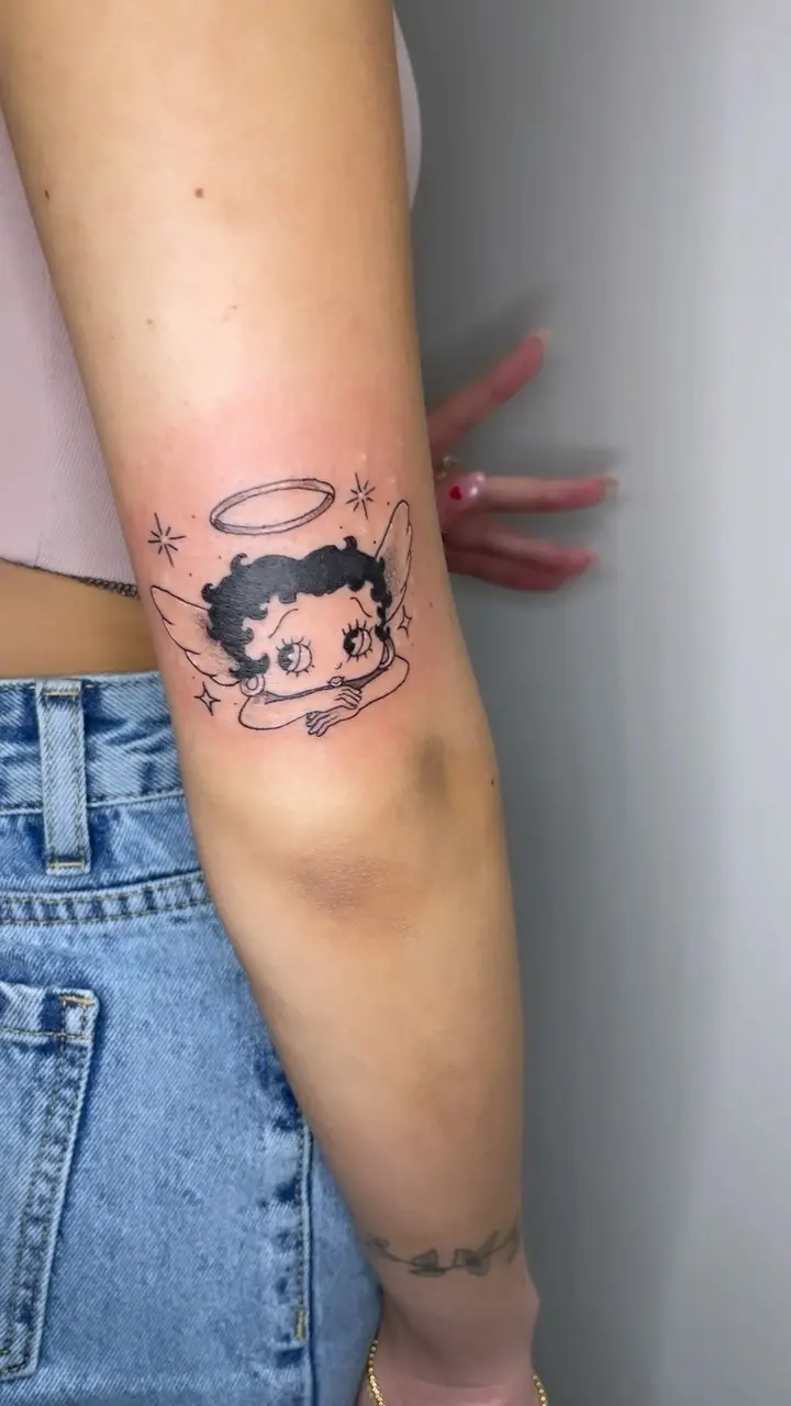 Betty Boop angel 😇 * * * #bettyboop #bettybooptattoo #angeltattoo #sparklytattoo #whiteinktattoo #blackwork…
