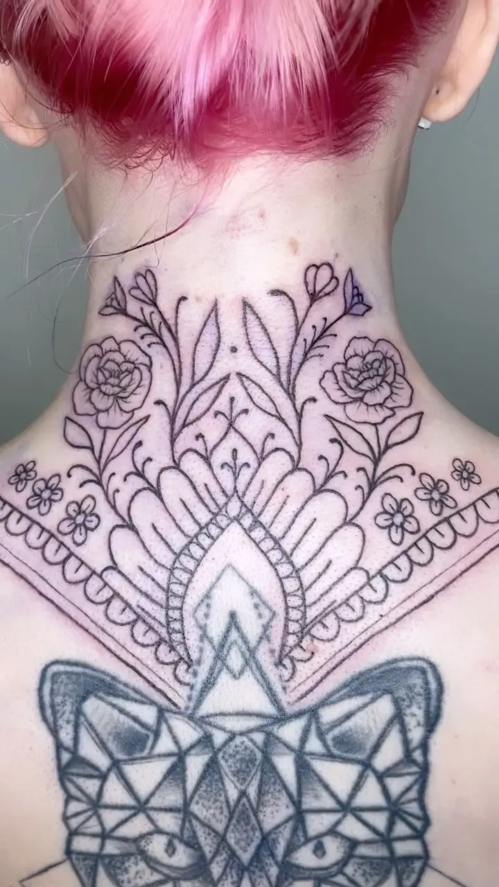 Neck piece on @seannaxogene today 😍🥰 * * * #necktattoo #backtattoo #linework #boldlines #tattoodesign #flowertattoo