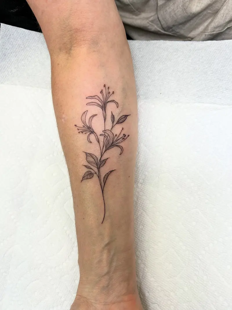 Some honeysuckle flowers done just before I left on my trip * * * #honeysuckle #armtattoo #firsttattoo #donegal…